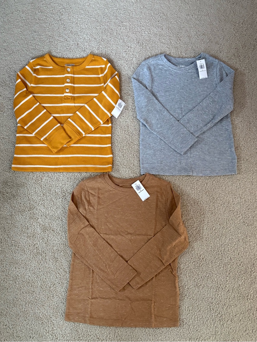 New with tags, 3-pack long sleeve tees for toddler., size 5T